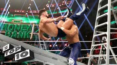 砸桌断梯铁笼顶旋转飞扑 WWE十大伤敌一千自损八百的亡命徒