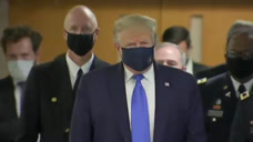 终于！特朗普首次在媒体镜头面前戴了口罩 此前曾多次拒绝